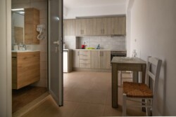 Irini apartments, the kitchen and the toilet of the first floor
