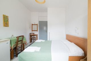 Irini Kamilari apartments, the bedroom and the entrance of room 1